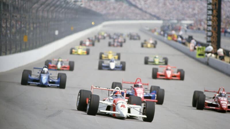 Indianapolis 500: Emerson Fittipaldi (4) in action, leading during race at Indianapolis Motor Speedway.