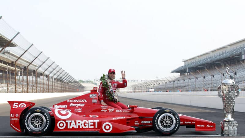 Indy 500 winner, Dario Franchitti of Scotland, driver of the #50 Target Chip Ganassi Racing Honda, poses with the Borg Warner Trophy