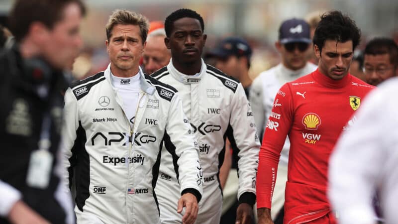 Sonny Hayes (Brad Pitt) and team-mate Noah Pearce (Damson Idris) walk the walk with real F1 heroes at Silverstone
