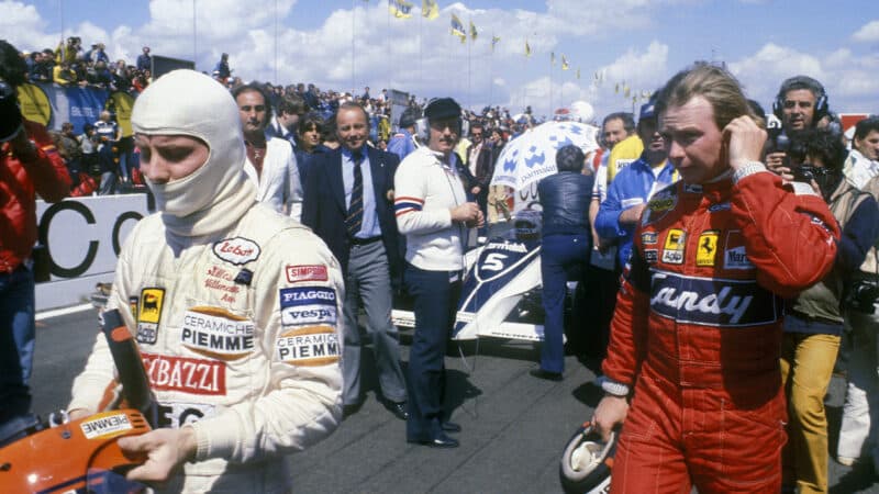 Gilles Villeneuve and Didier Pironi leave their F1 cars on the grid at Zolder in protest about narrow pitlane at the 1981 Belgian Grand Prix
