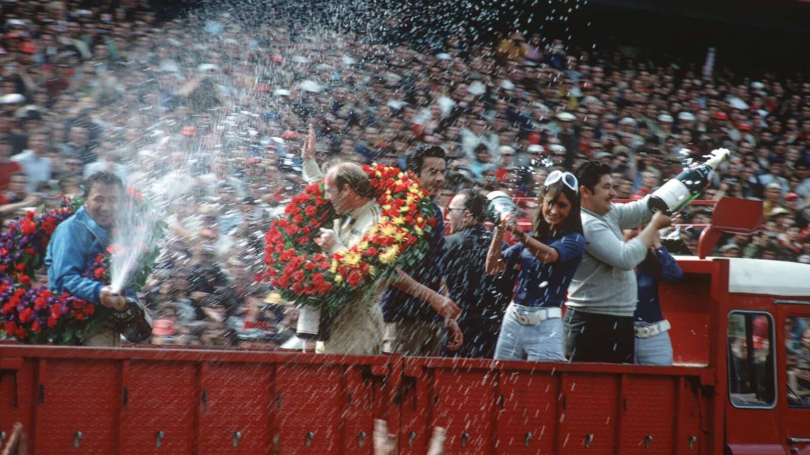 Hans Herrmann and Richard Attwood celebrate Le Mans 1970 win