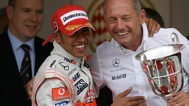 Lewis Hamilton and Ron Dennis celebrate victory in the 2008 F1 Monaco Grand Prix on the podium