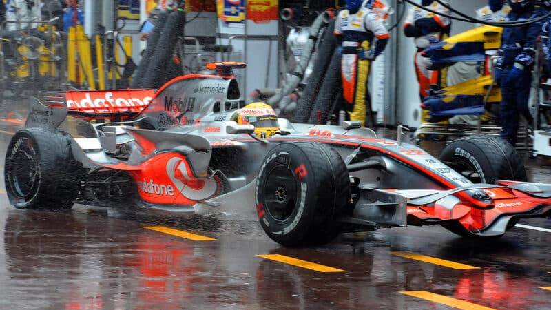 Lewis Hamilton drives his McLaren into the pits with a broken right rear wheel at the 2008 F1 Monaco Grand Prix