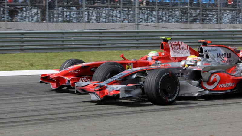 McLaren of Lewis Hamilton and Ferrari of Felipe Massa side by side in the 2008 F1 Turkish Grand Prix