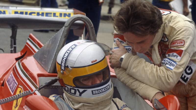 Ferrari drivers Jody Scheckter and Gilles Villeneuve in the pits before the 1979 Argentina Grand Prix