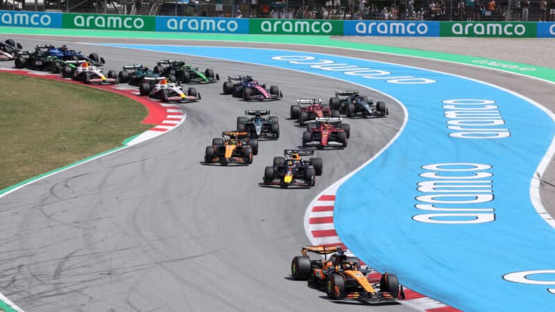 Oscar Piastri leads at the start of the Spanish GP