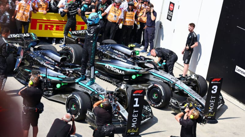Mercedes drivers George Russell and Kimi Antonelli in the pits after the 2025 Canadian Grand Prix