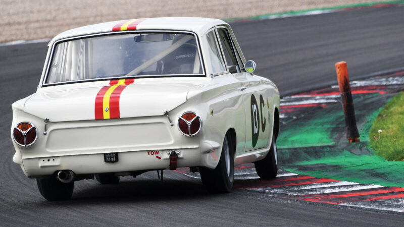 same track, for the Historic Festival. Max Lynn slides a Lotus Cortina through Redgate in the U2TC race