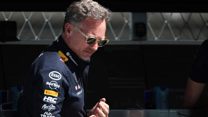 Christian Horner wearing sunglasses during the 2025 F1 Spanish Grand Prix weekend