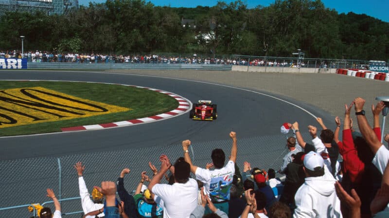 Fans in Montreal cheer on the Ferrari of Jean Alesi during the 1995 Canadian Grand Prix