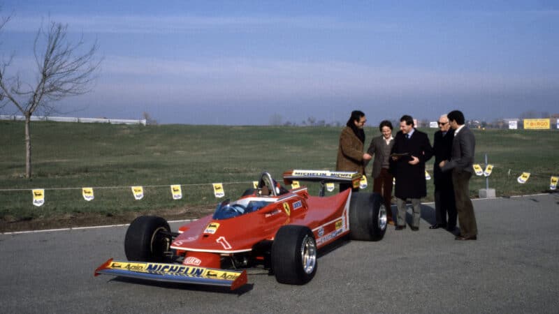 Introduction of the Ferrari 312T4 at the Fiorano test circuit with (from l.) Mauro Forghieri, Gilles Villeneuve, Marco Piccinini, Enzo Ferrari and Jody Scheckter, Ferrari Factory, Maranello.
