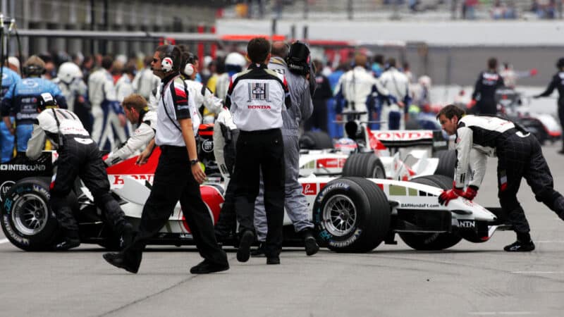 Jenson Button (GBR) BAR Honda 007 joins the Michelin runners into the pits at the end of the formation lap to not start the race.