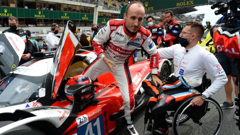 Robert Kubica climbs out of LMP2 car ahead of the 2021 Le Mans 234 Hours