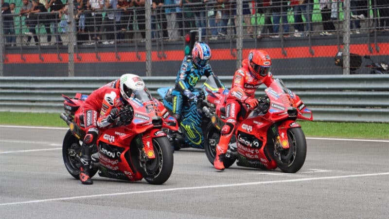 Bagnaia and Marquez locking and loading their Desmosedicis for practice starts during February’s pre-season tests at Sepang