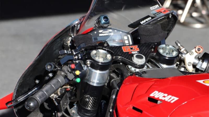 Bagnaia continues to use the wingnut-type holeshot engager to the left of the fork tops. Note the kill switch on the right handlebar, guarded by a surround, to prevent the rider hitting it by mistake