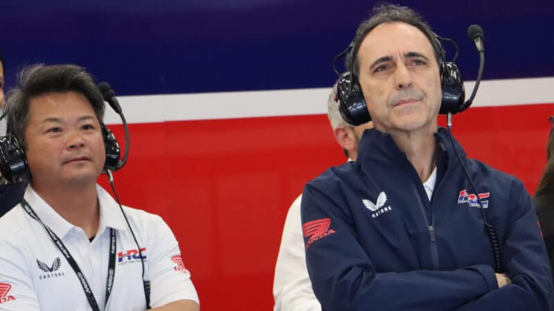 HRC technical director Albesiano [right] watches Silverstone practice with HRC colleagues