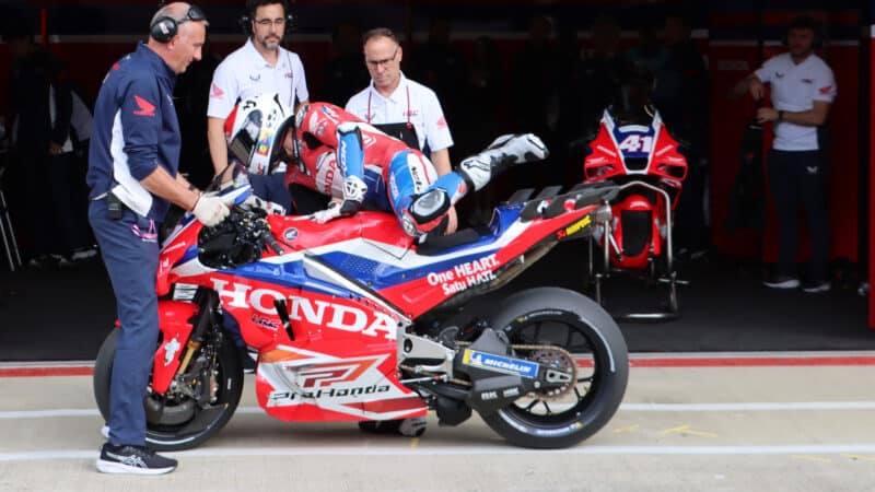 HRC test rider Espargaro and crew during the British GP