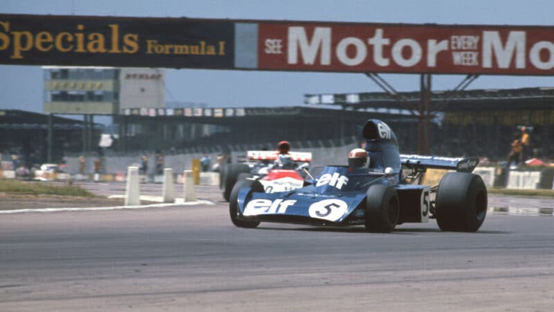 Jackie Stewart (Tyrrell-Ford) leads Jean-Pierre Beltoise (BRM) in the 1973 British Grand Prix in Silverston