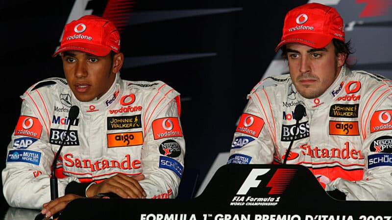 Lewis Hamilton and Fernando Alonso (McLaren-Mercedes) in the FIA press conference after qualifying for the 2007 Italian Grand Prix