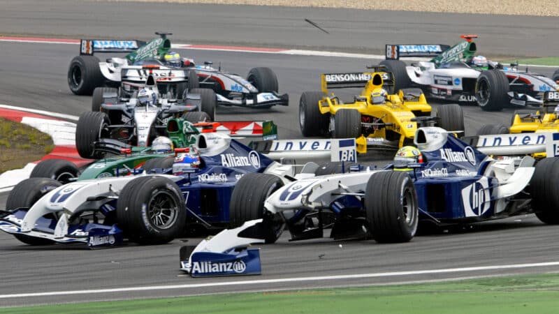 The Williams-BMW drivers Juan-Pabllo Montoya and Ralf Schumacher crash in the first corner of the 2004 European Grand Prix