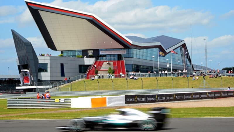 Lewis Hamilton (Mercedes) in front of The Wing during practice for the 2016 British Grand Prix