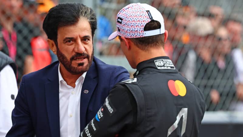 Lando Norris (McLaren-Mercedes) and Mohammed ben Sulayem FIA after qualifying for the 2025 British Grand Prix