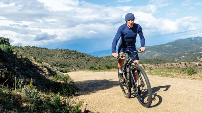 Delecour cycling his bike
