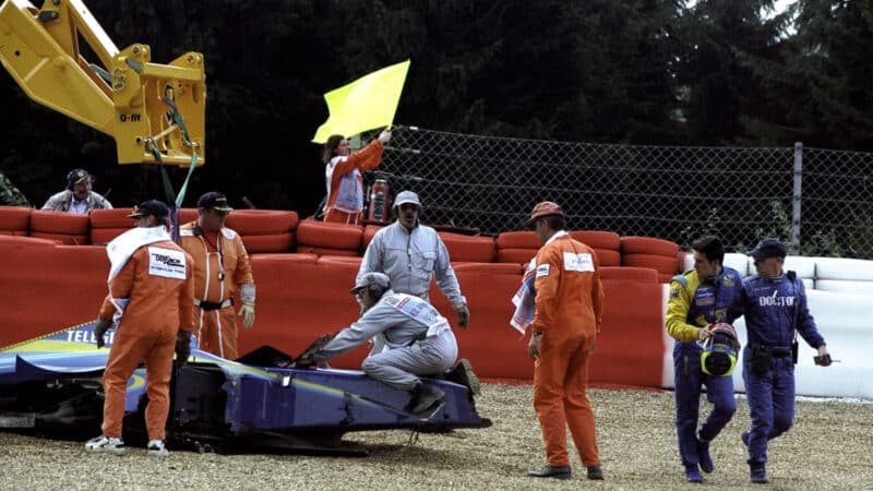 Ricardo Zonta of British American Racing walks away after crashing his car at the Eau Rouge