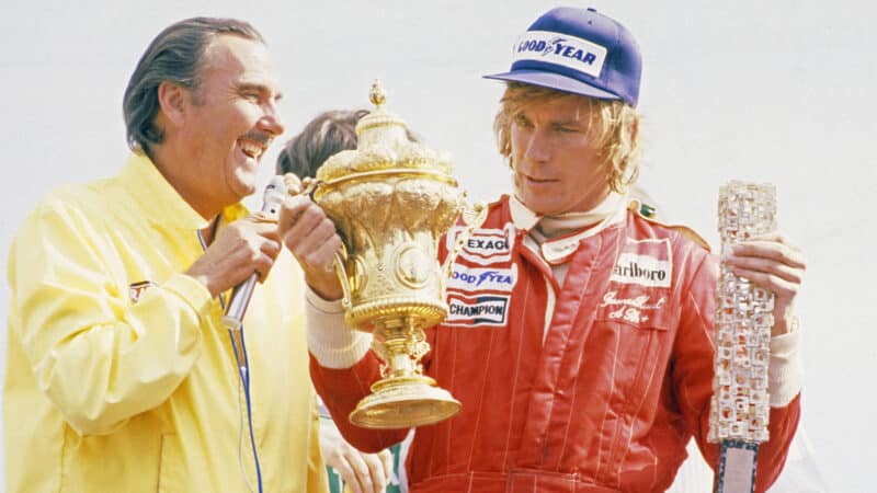 James Hunt with 1977 F1 British Grand Prix trophy
