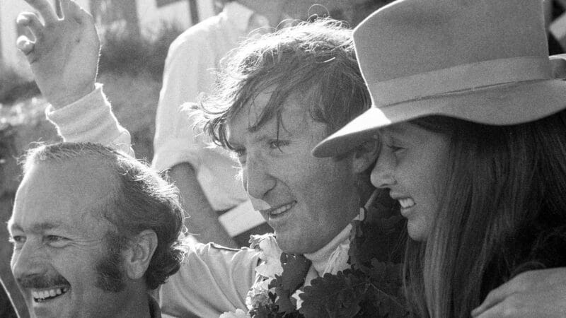 Jochen Rindt celebrates victory in the 1970 F1 French Grand Prix at Clermont Ferrand with Colin Chapman and Nina Rindt