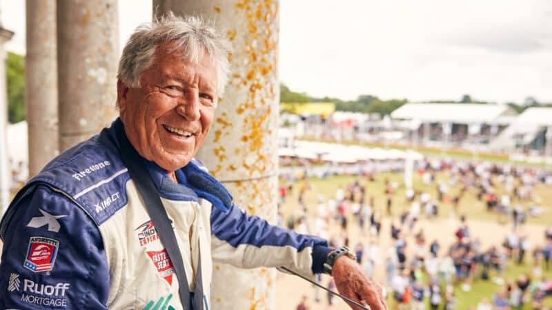 Mario Andretti on the balcony at Goodwood House
