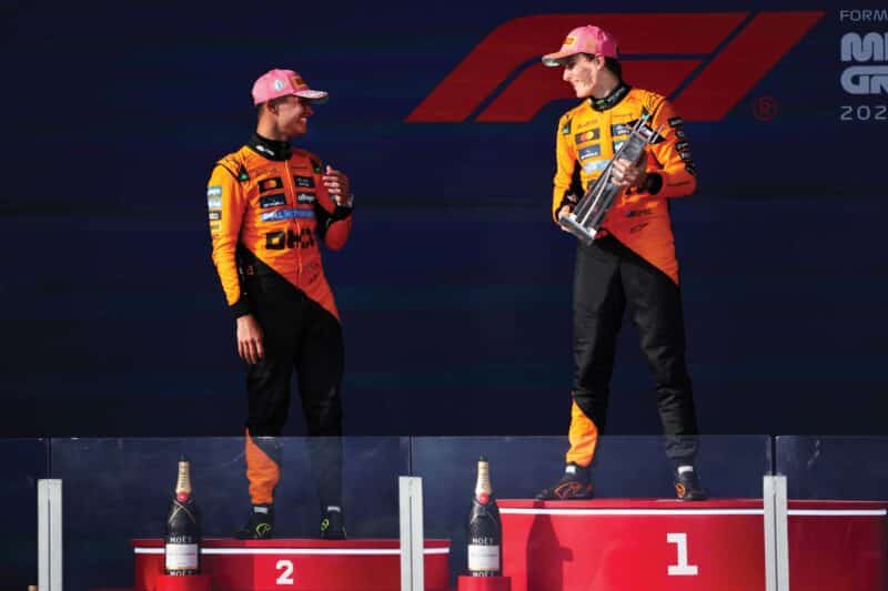 Miami, Oscar Piastri 1st on podium laughing with Lando Norris
