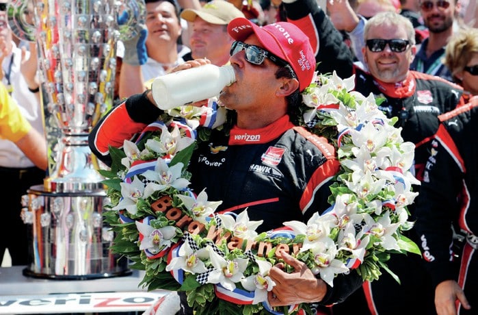 Juan Pablo Montoya drinks the milk after winning the 2015 Indy 500