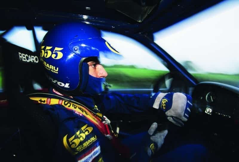 Carlos Sainz behind the wheel of his 1995 Subaru