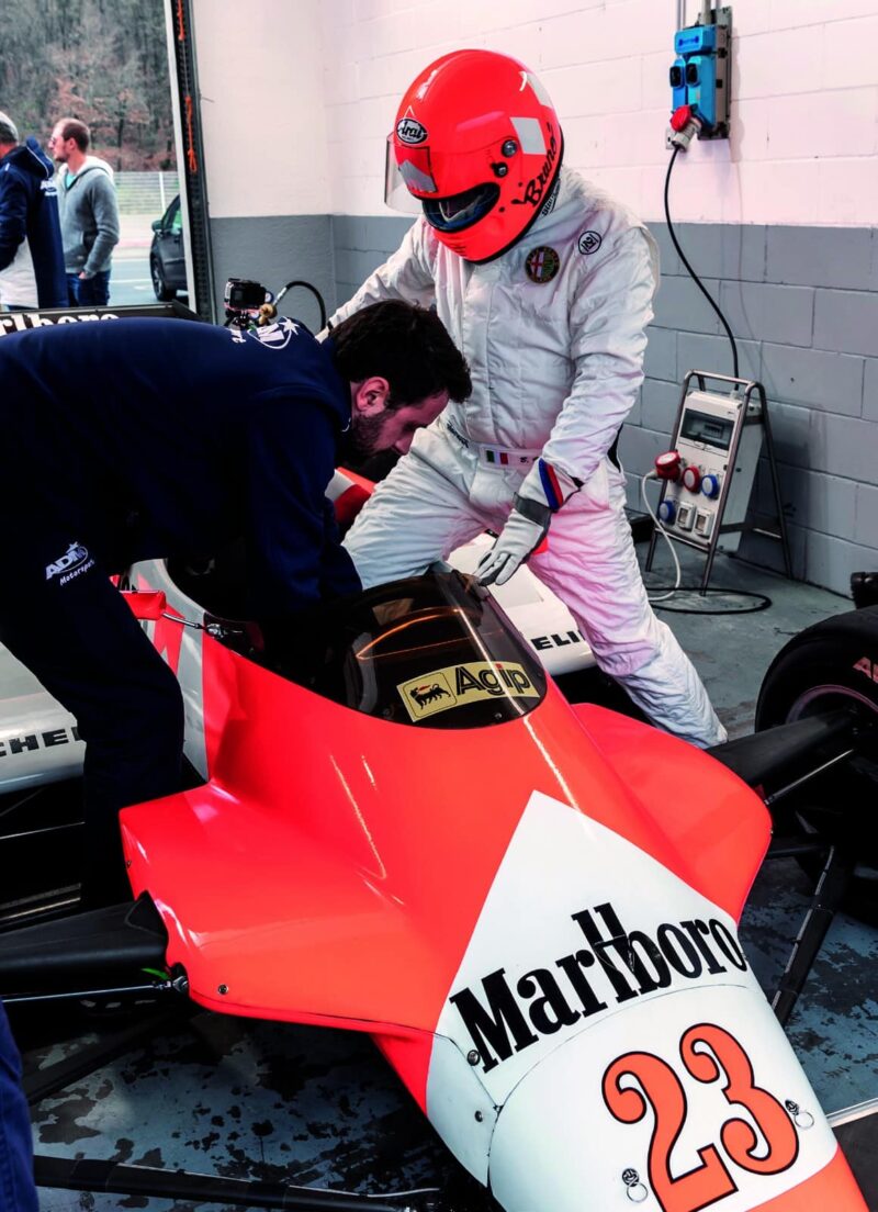 Bruno Giacomelli climbs into his restored Alfa Romeo 182